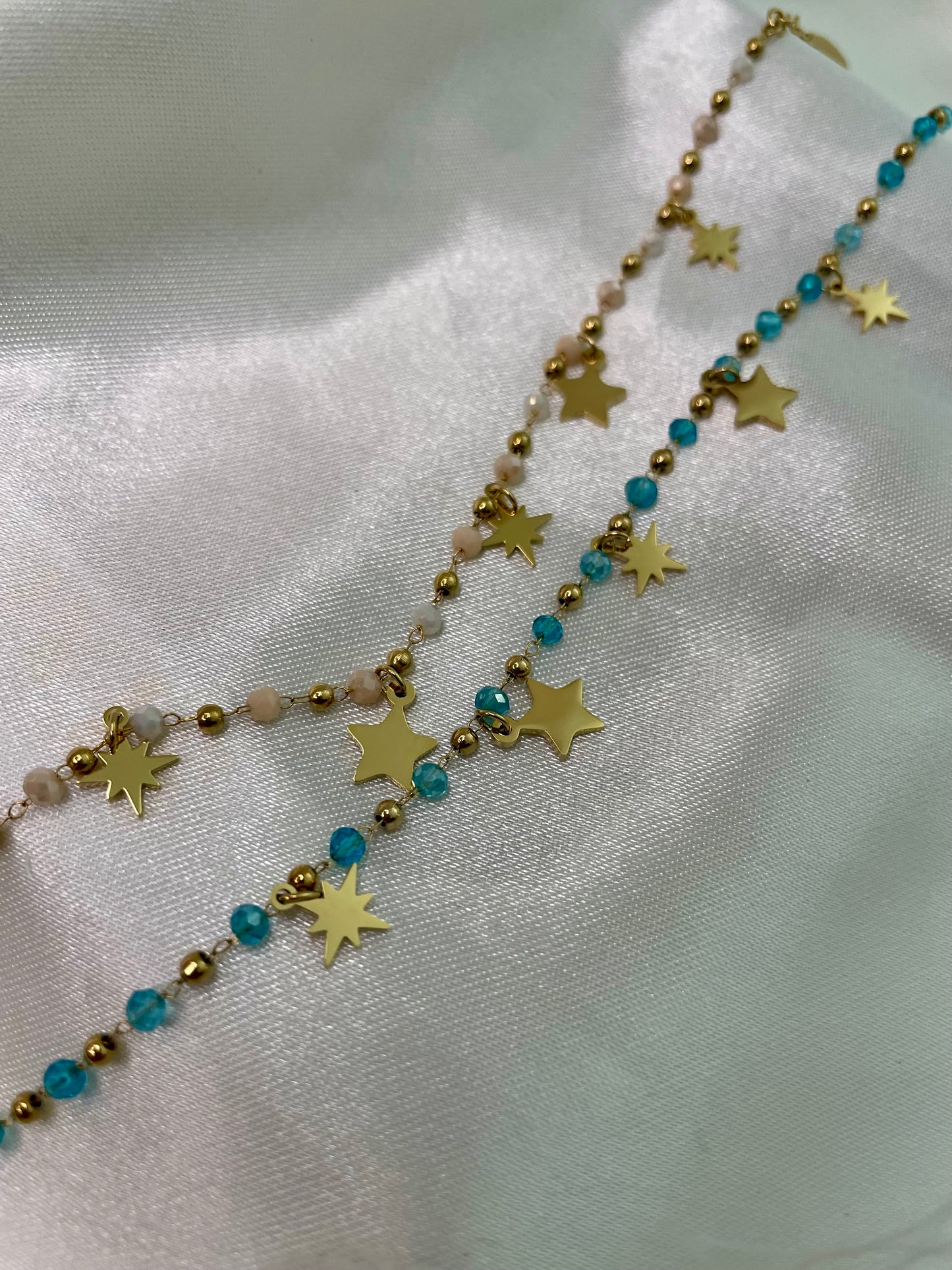 BRACCIALE CON STELLE E PERLINE