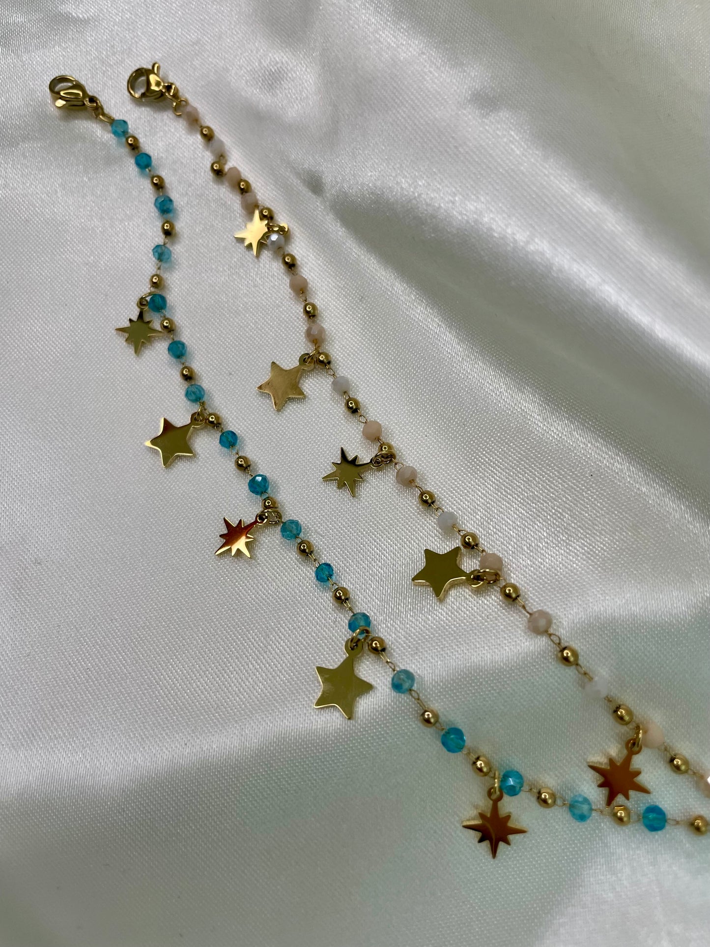 BRACCIALE CON STELLE E PERLINE