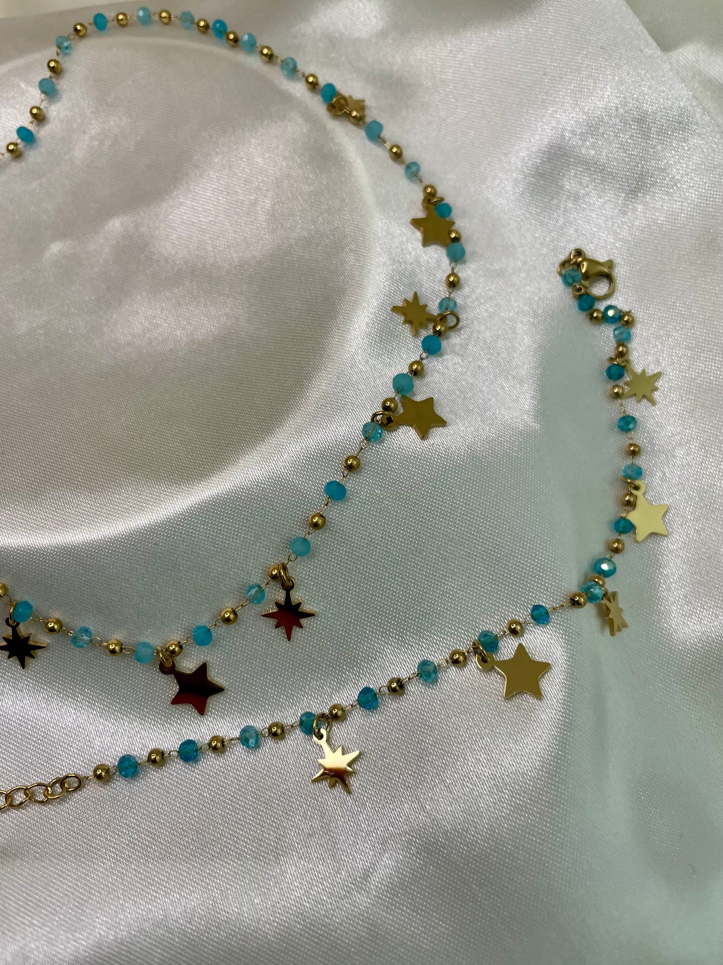 BRACCIALE CON STELLE E PERLINE