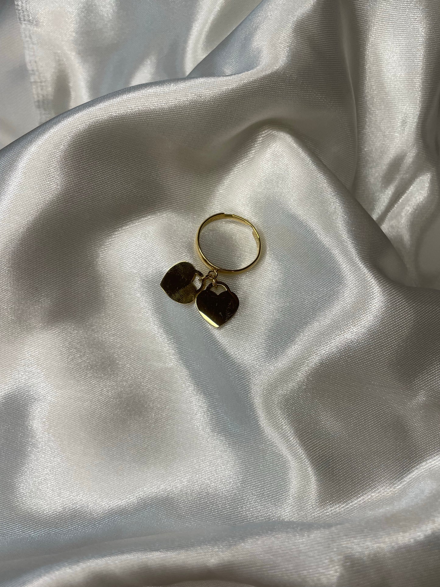 ANELLO CUORI PENDENTI