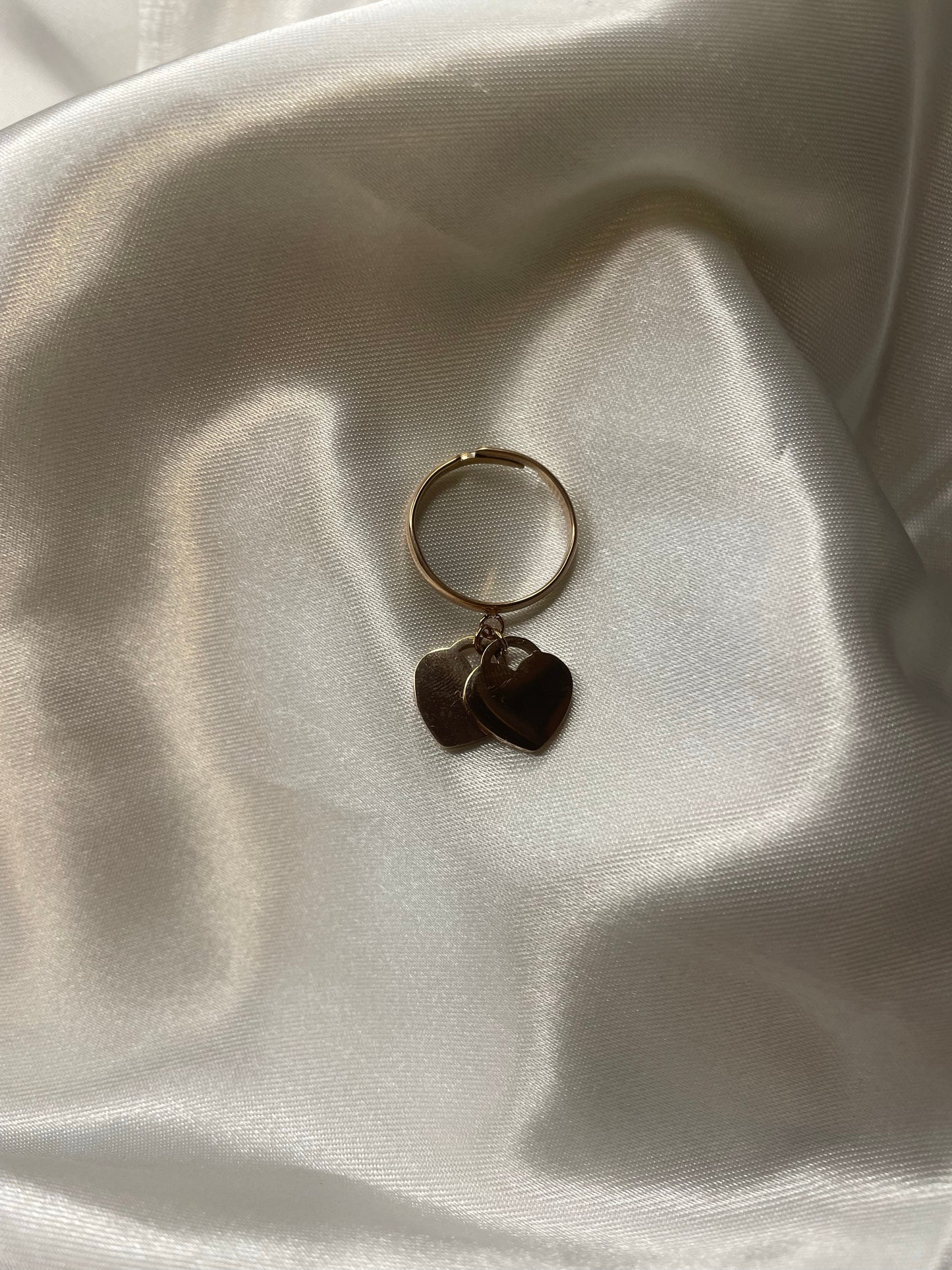 ANELLO CUORI PENDENTI