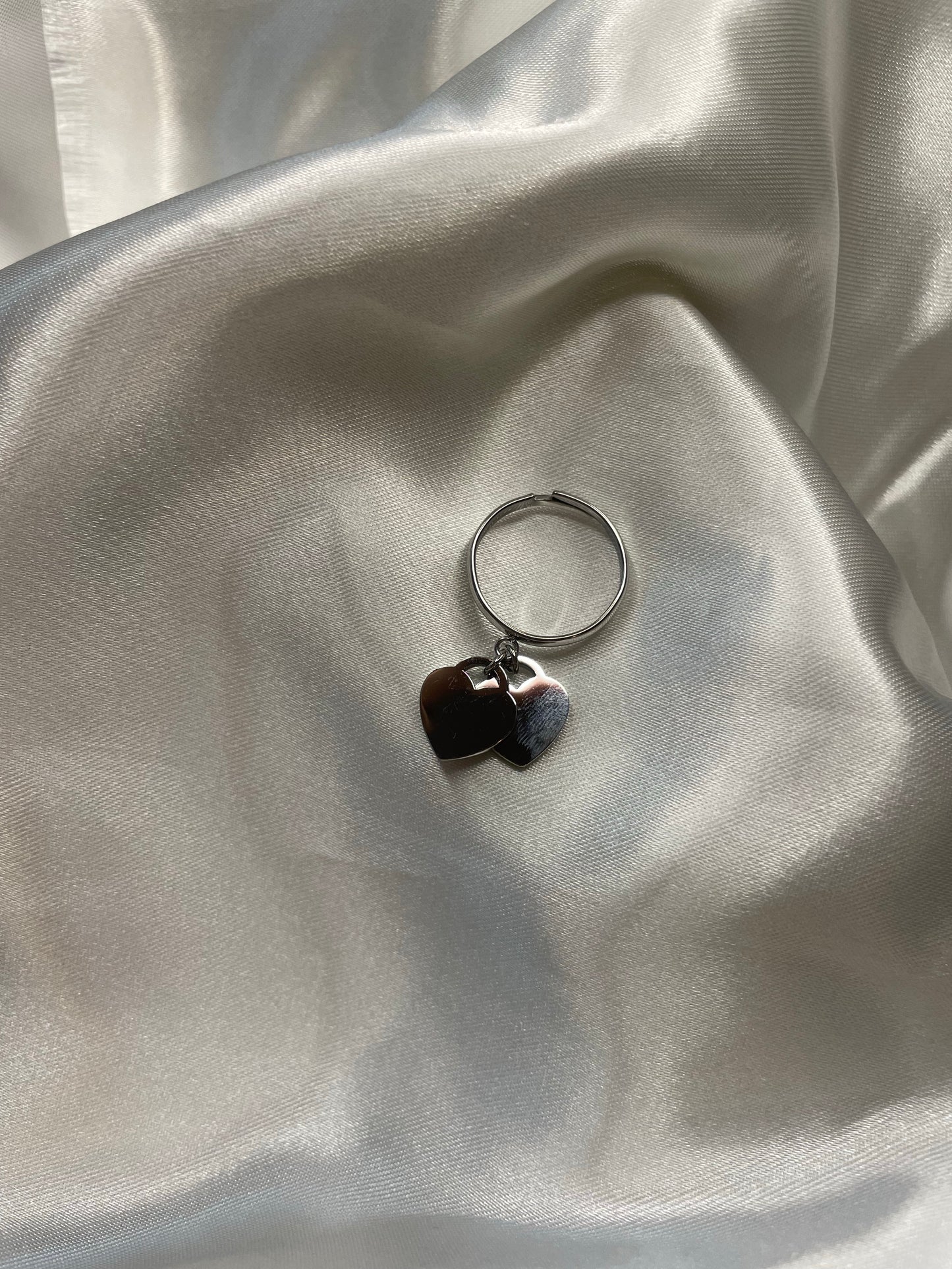 ANELLO CUORI PENDENTI